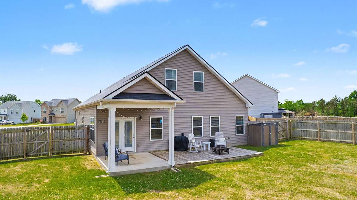 Amazing private backyard with covered patio and large deck.