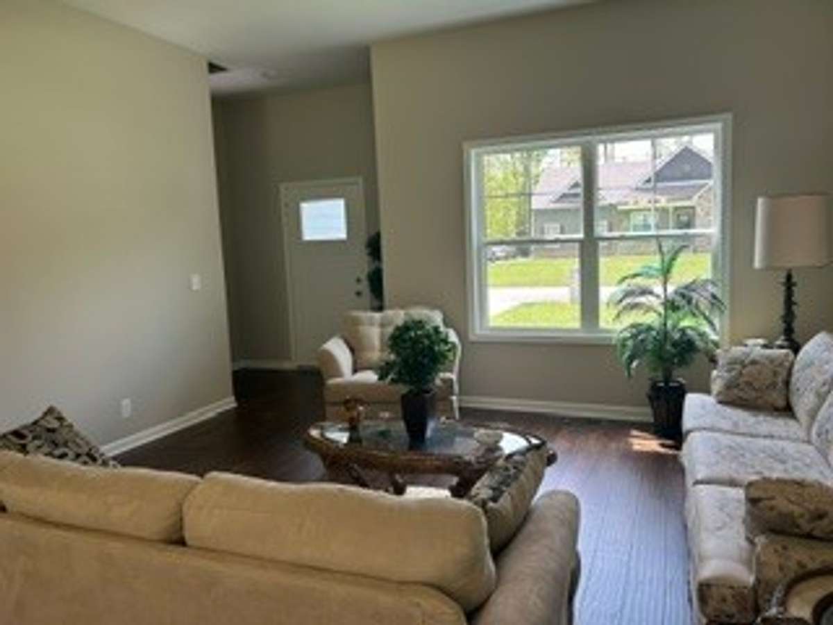Very Attractive Vinyl Plank floor in living room.