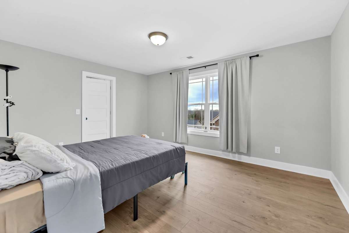 Spacious secondary bedrooms ideal for guests, kids, or office use.