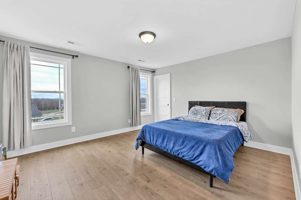 Spacious secondary bedrooms ideal for guests, kids, or office use.