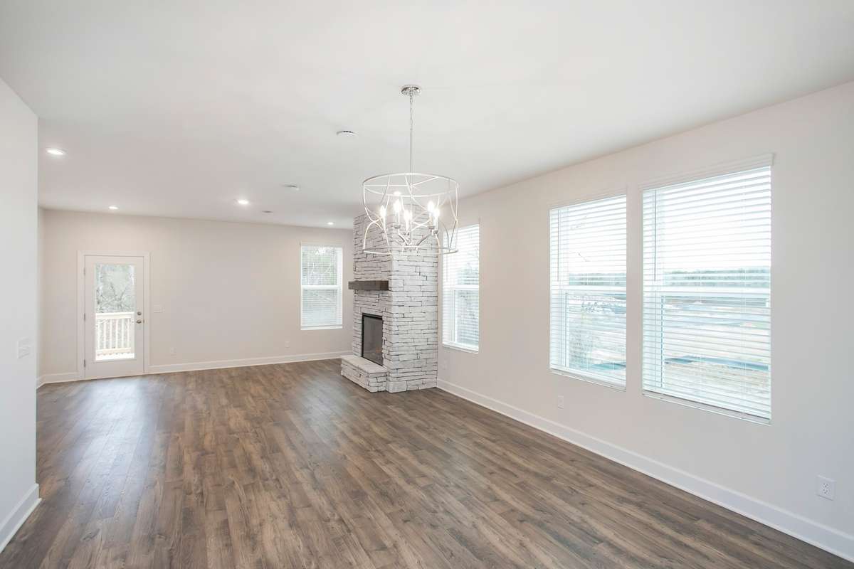 Main living and dining space! Build a Lexington on a lot of your choice!! Photos are of an example home, all upgrades and finishes would be based on your selections!