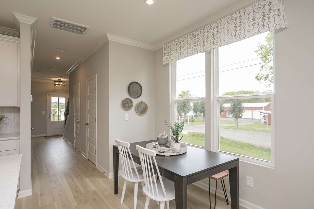 Stock photo of a similar home in a different community