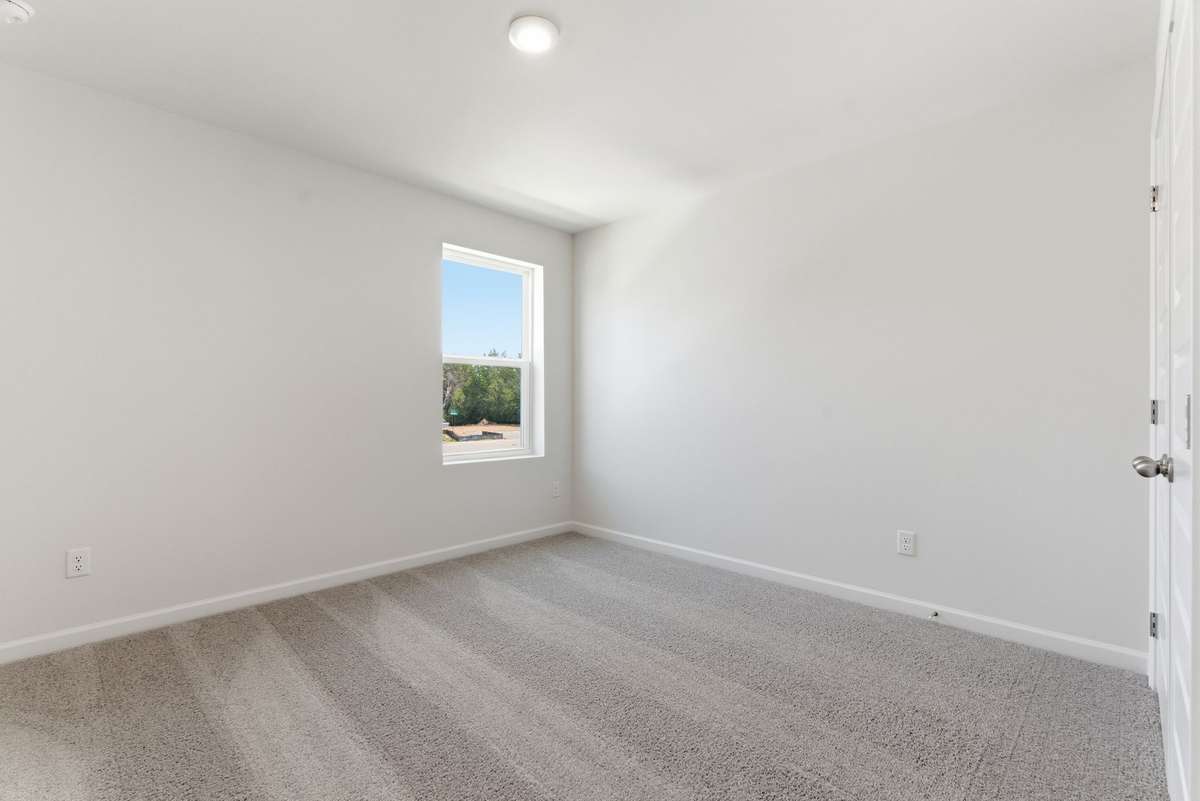 Bedroom 4 makes for a great space for a nursery, office, gym and more.