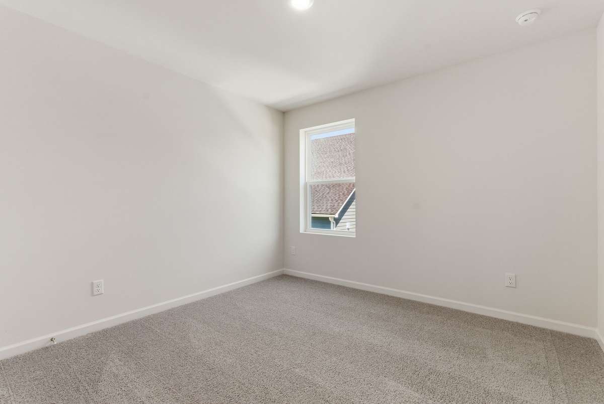 Spacious secondary bedroom.