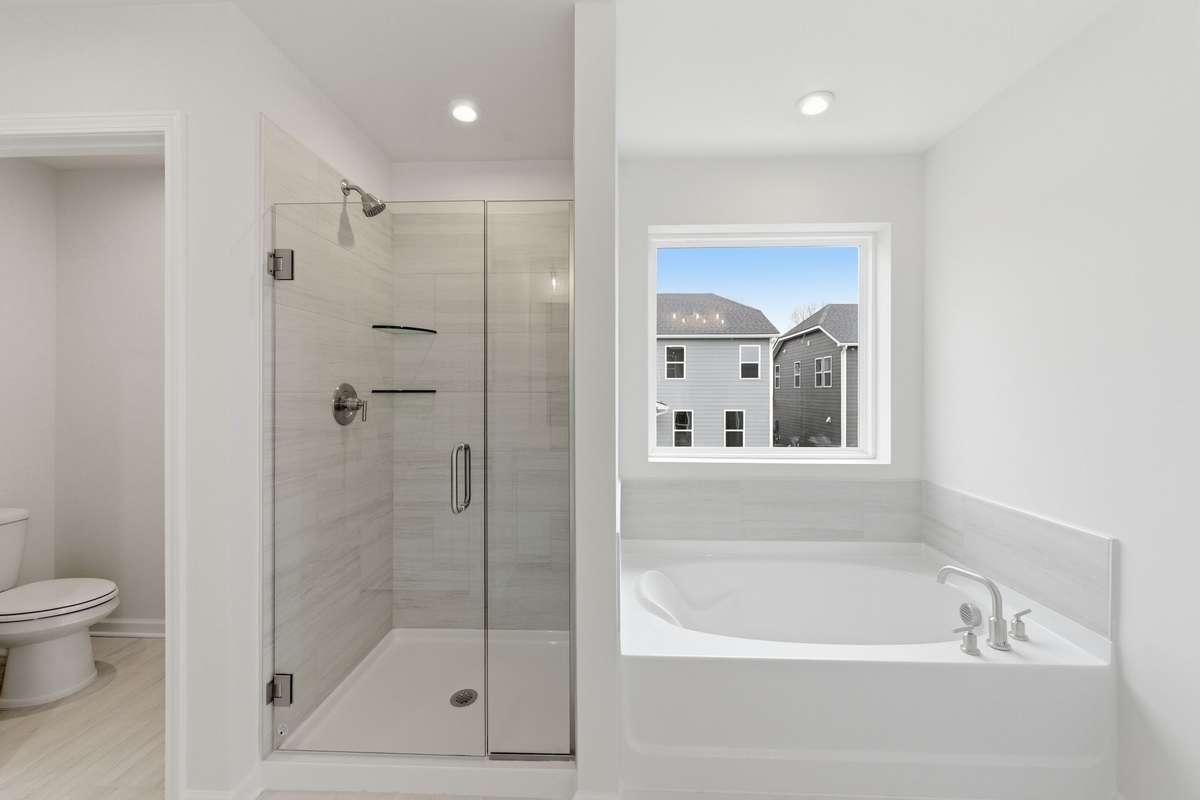 Tile Shower and separate tub for those long workdays.