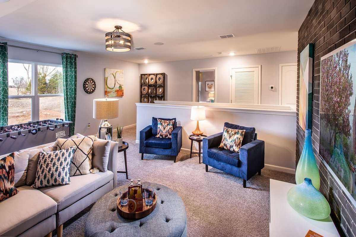 Large bonus room upstairs. *All photos are of previous model home*