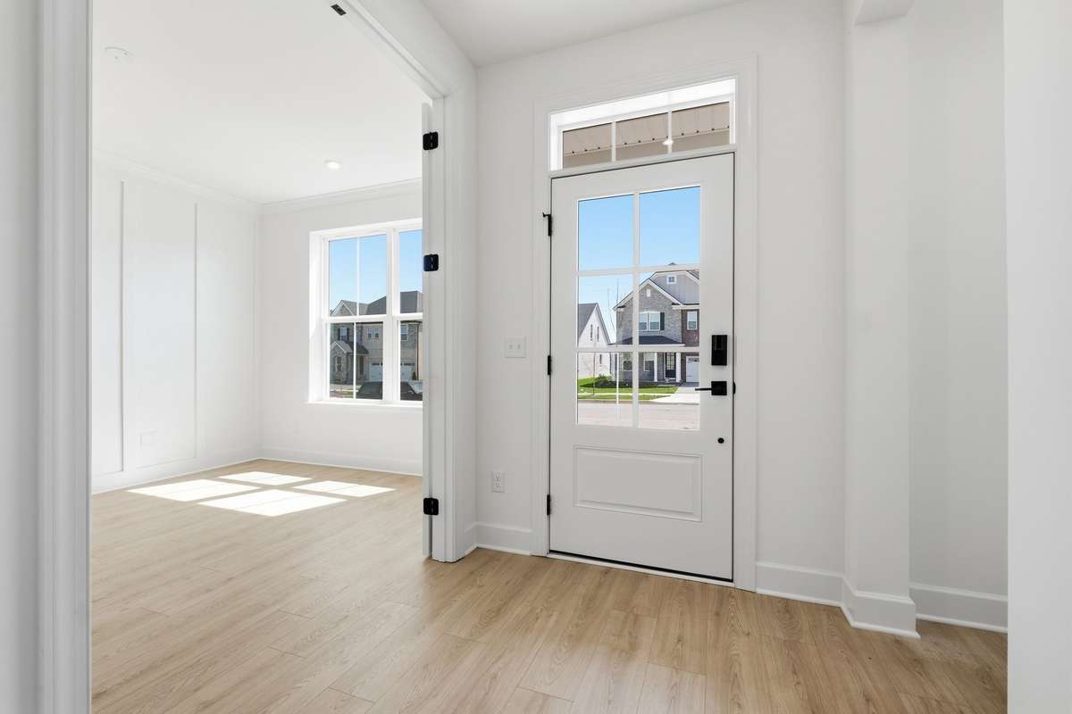Dedicated, sun lit, office space in the front of the home.(Stock Photos of similar model)