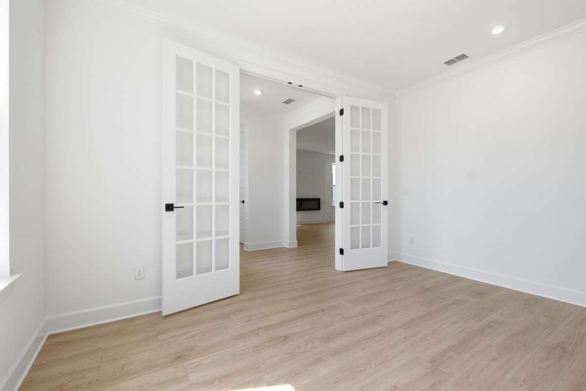 Dedicated, sun lit, office space in the front of the home.(Stock Photos of similar model)
