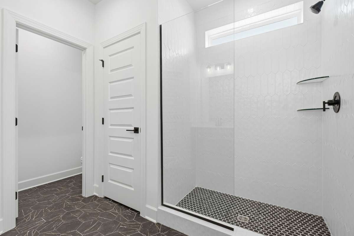 Primary en suite with oversized shower.(Stock Photos of similar model)