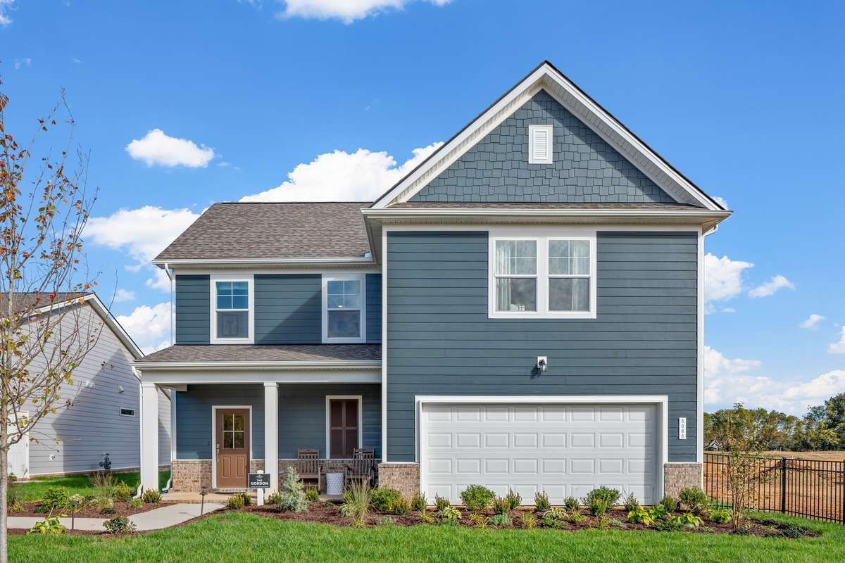 Picture of actual home being sold.  Driveway is complete and home is ready to move in!