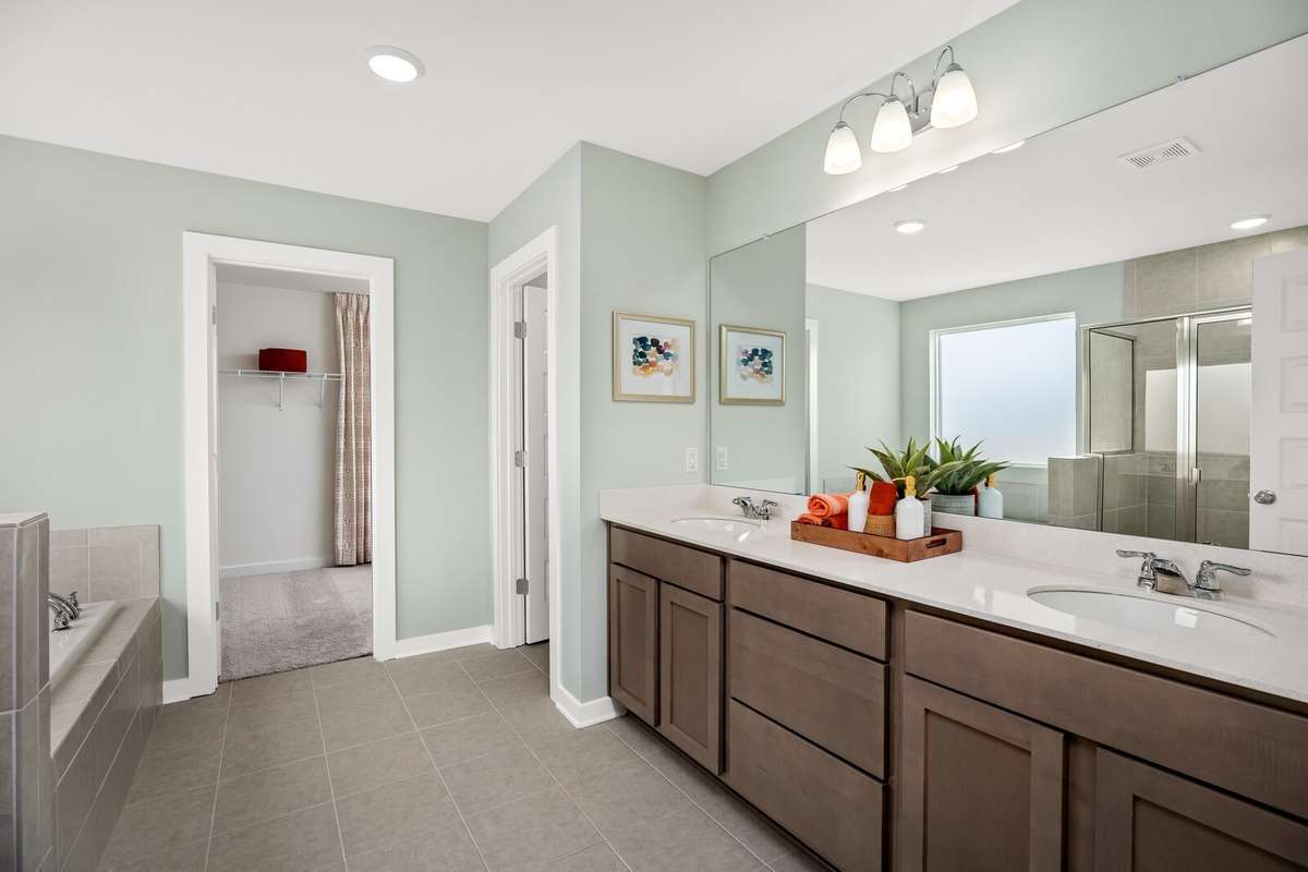 Picture of actual home being sold.  Home will be ready to move in for month of March.  Furniture will be removed, but curtains and appliances remain.