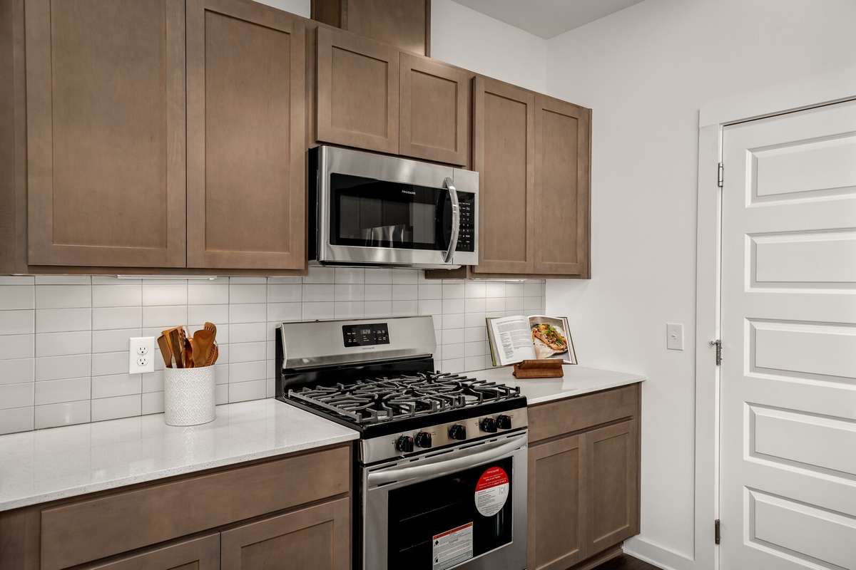 Picture of actual home being sold.  Home will be ready to move in for month of March.  Furniture will be removed, but curtains and appliances remain.