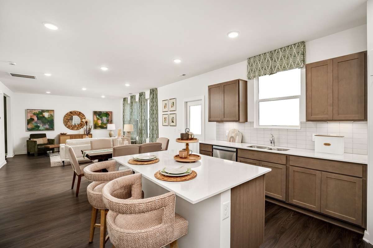 Picture of actual home being sold.  Home will be ready to move in for month of March.  Furniture will be removed, but curtains and appliances remain.