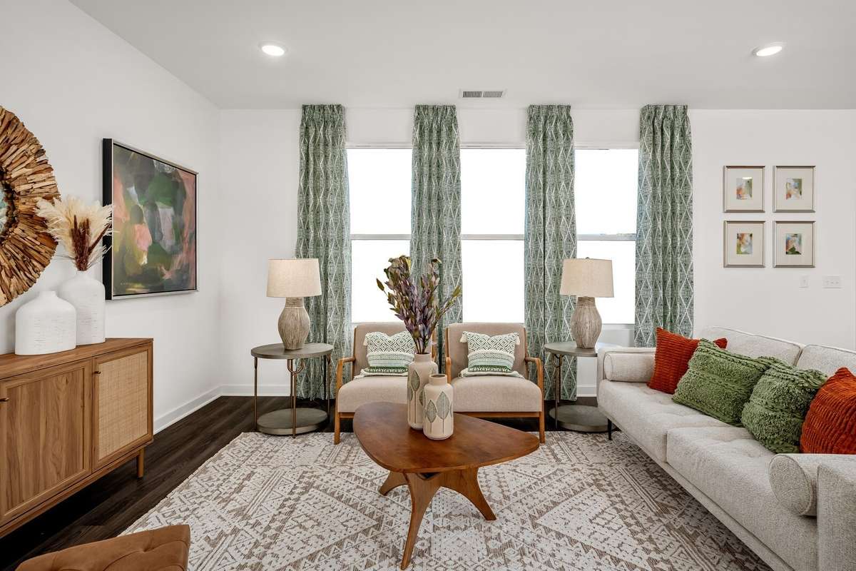 Picture of actual home being sold.  Home will be ready to move in for month of March.  Furniture will be removed, but curtains and appliances remain.