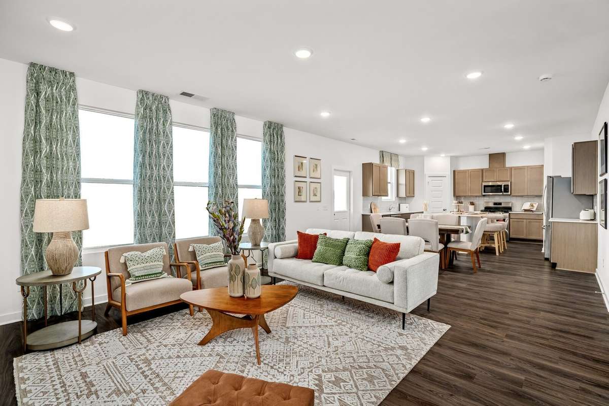 Picture of actual home being sold.  Home will be ready to move in for month of March.  Furniture will be removed, but curtains and appliances remain.
