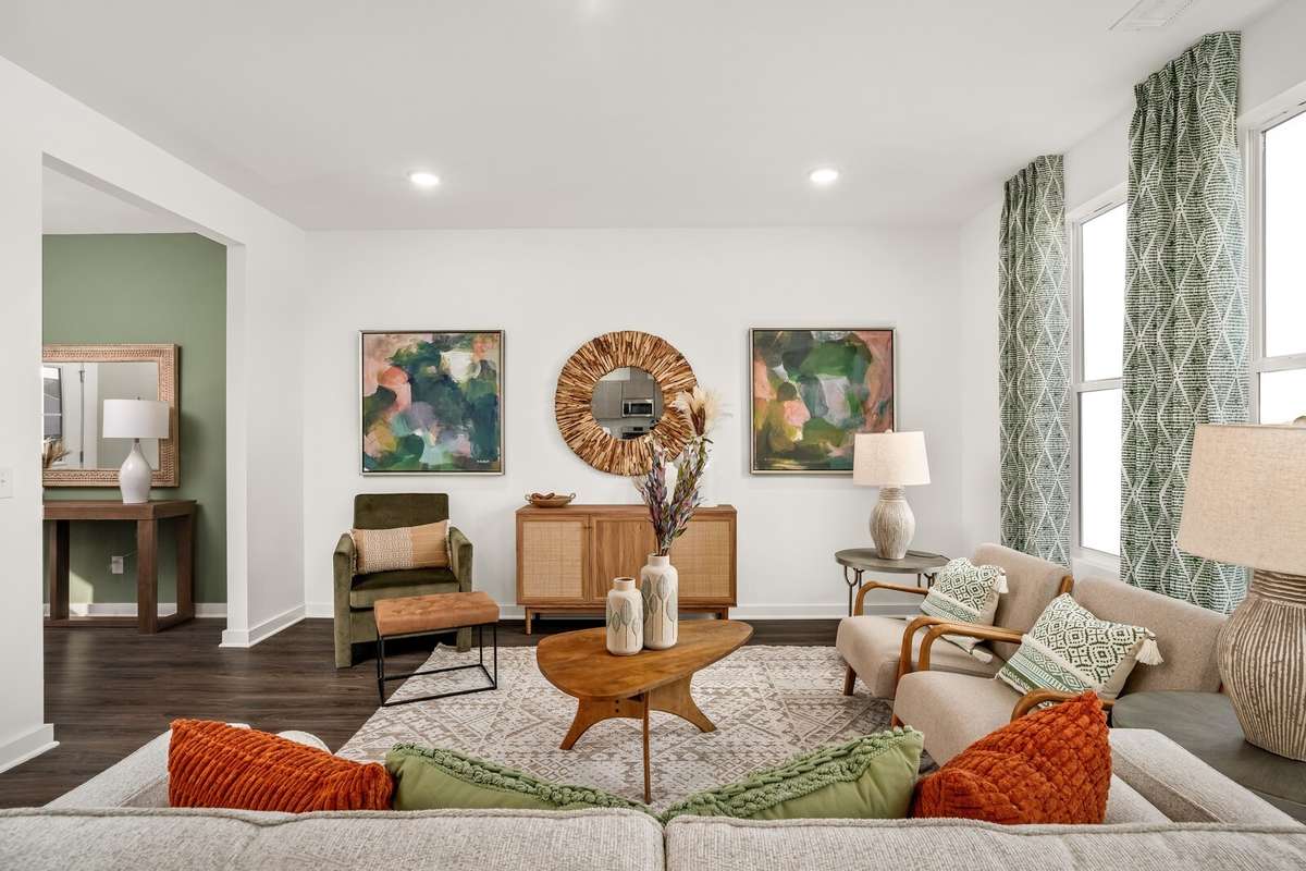 Picture of actual home being sold.  Home will be ready to move in for month of March.  Furniture will be removed, but curtains and appliances remain.