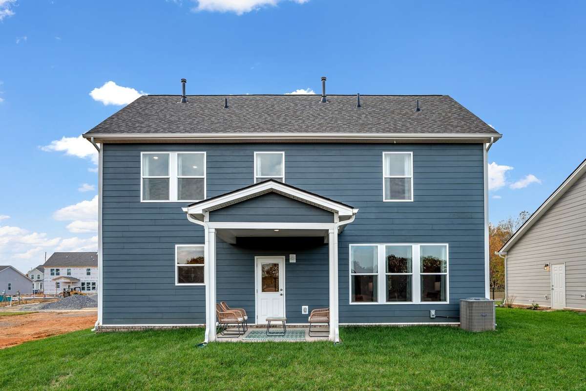 Picture of actual home being sold.  Home will be ready to move in for month of March.  Furniture will be removed, but curtains and appliances remain.