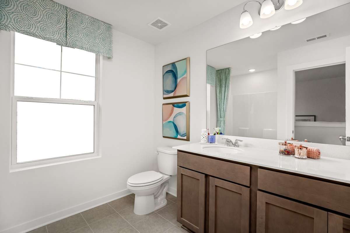 Picture of actual home being sold.  Home will be ready to move in for month of March.  Furniture will be removed, but curtains and appliances remain.
