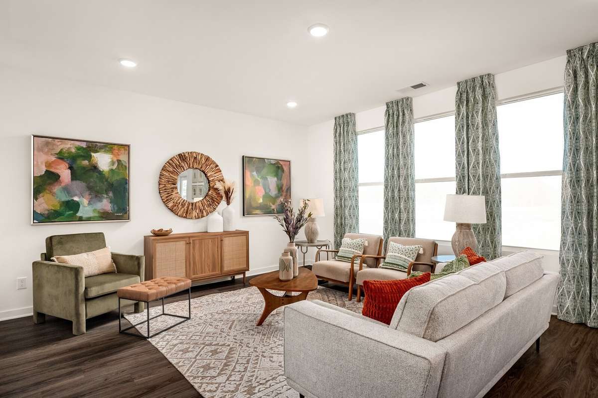 Picture of actual home being sold.  Home will be ready to move in for month of March.  Furniture will be removed, but curtains and appliances remain.