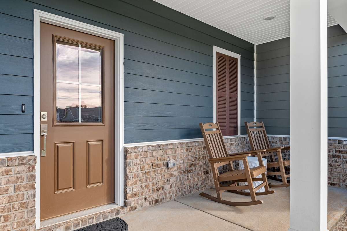 Picture of actual home being sold.  Home will be ready to move in for month of March.  Furniture will be removed, but curtains and appliances remain.