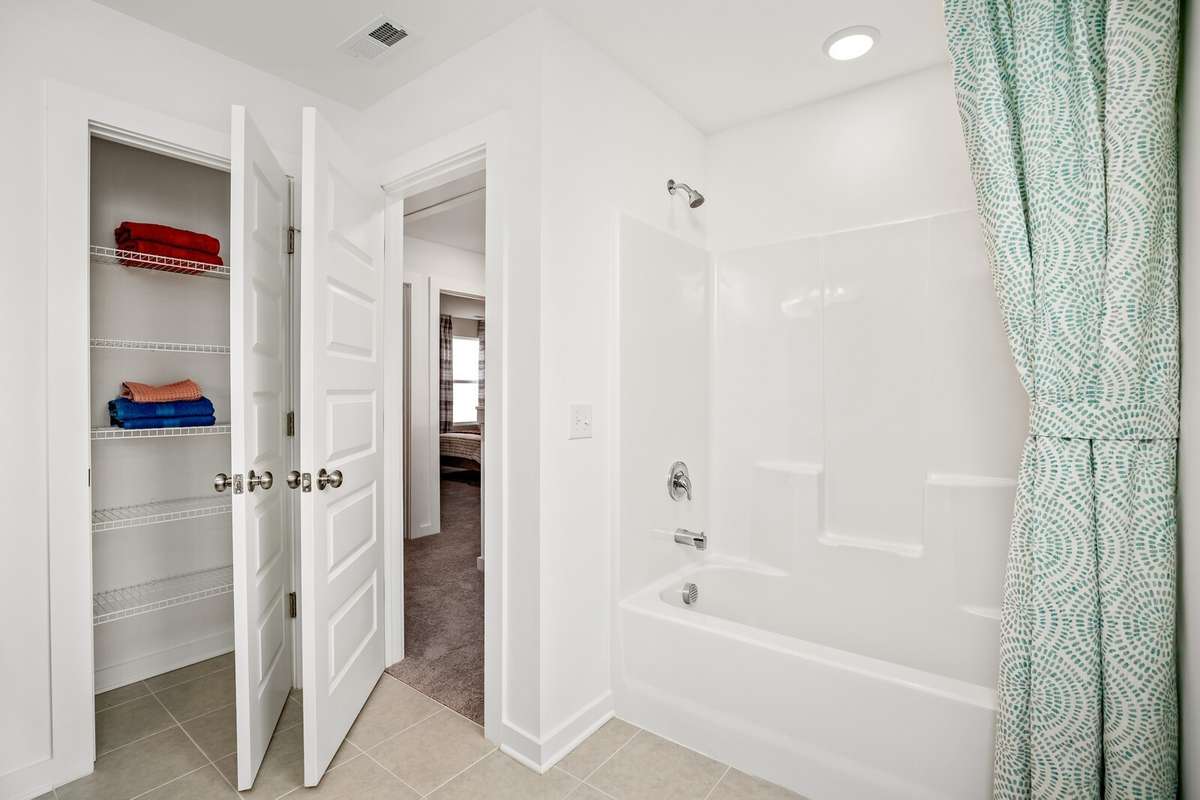 Picture of actual home being sold.  Home will be ready to move in for month of March.  Furniture will be removed, but curtains and appliances remain.