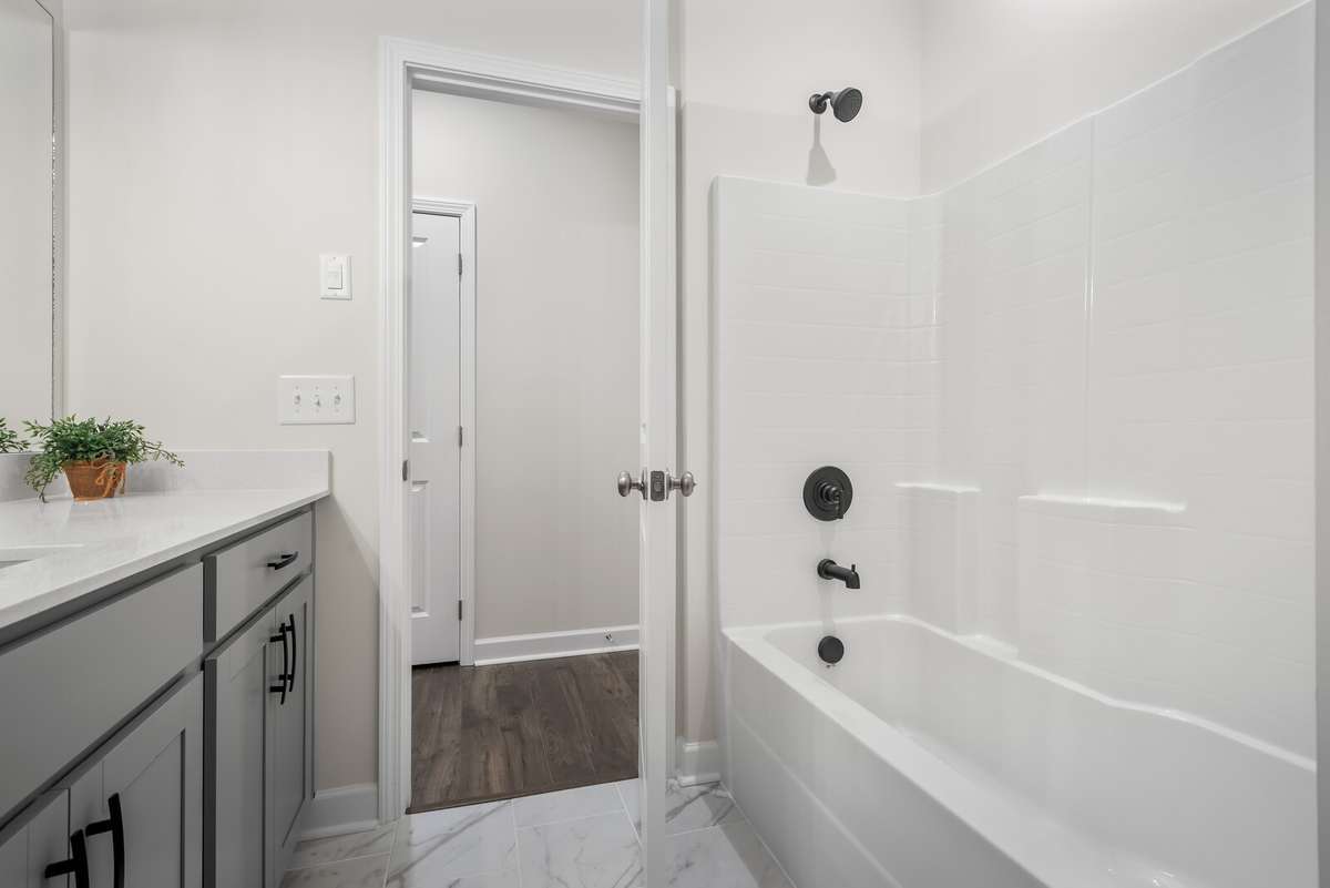 NOT ACTUAL HOME. Picture of another home in the community showing layout and optional features.