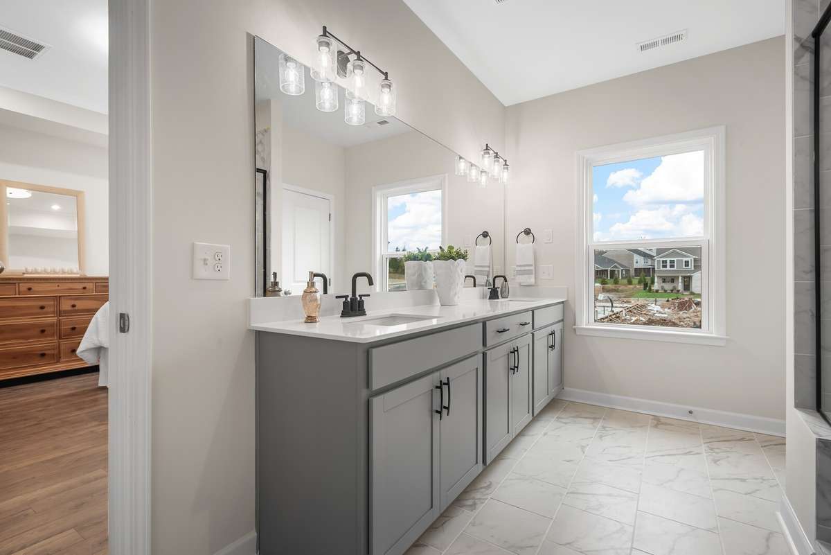 NOT ACTUAL HOME. Picture of another home in the community showing layout and optional features.