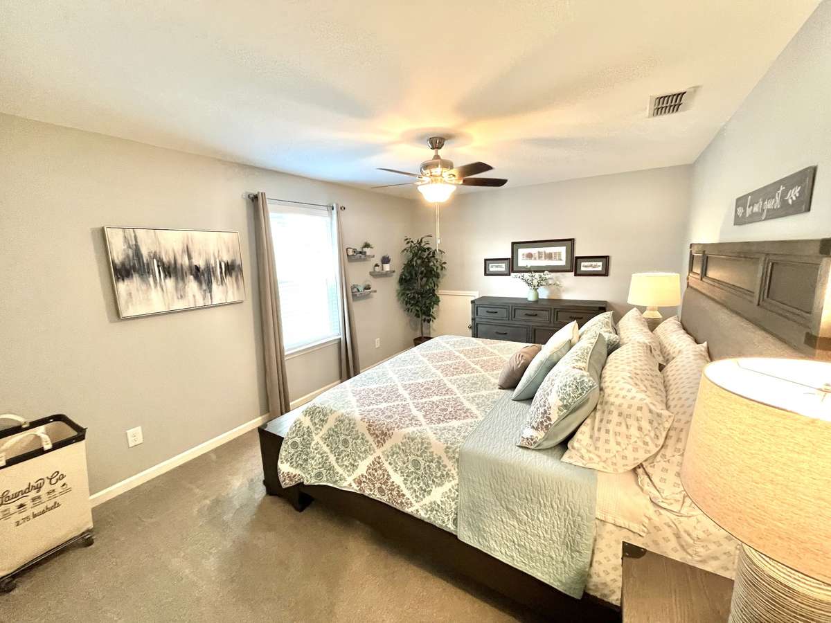 King size bed in oversized secondary bedroom upstairs. Great for the older teen or guest room.