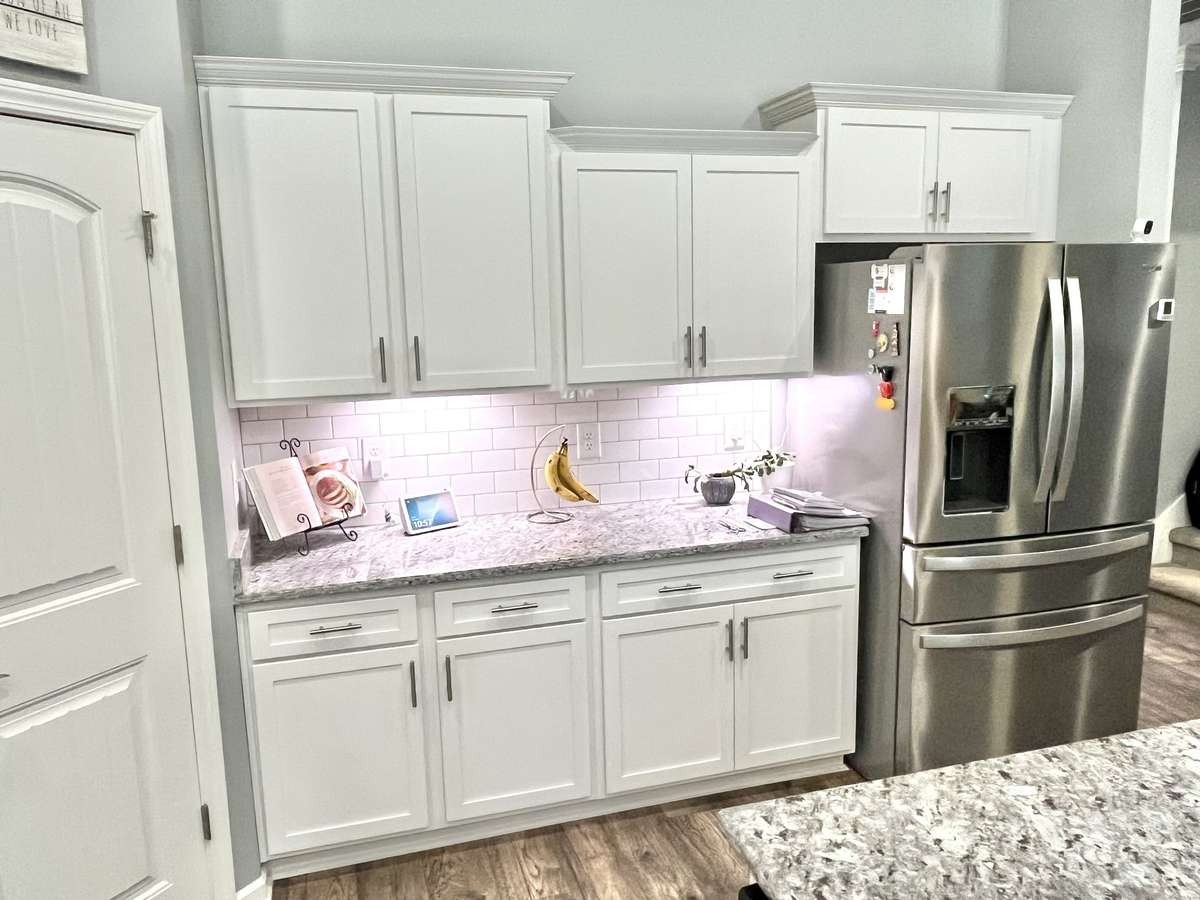 Great spot for a little coffee bar, don't you think? Note high end fridge (negotiable)
