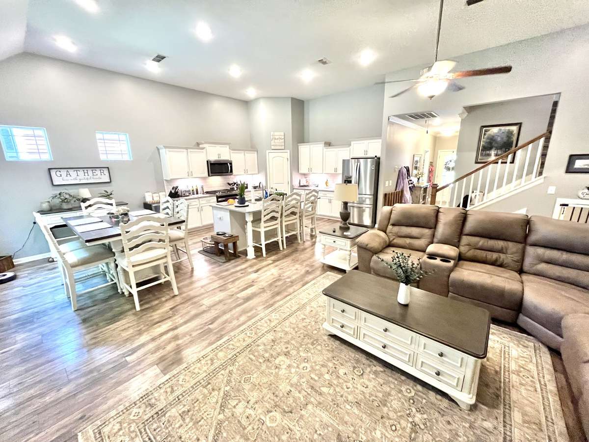 Impressive Great Room with 12 ft ceilings spark images of future gatherings
