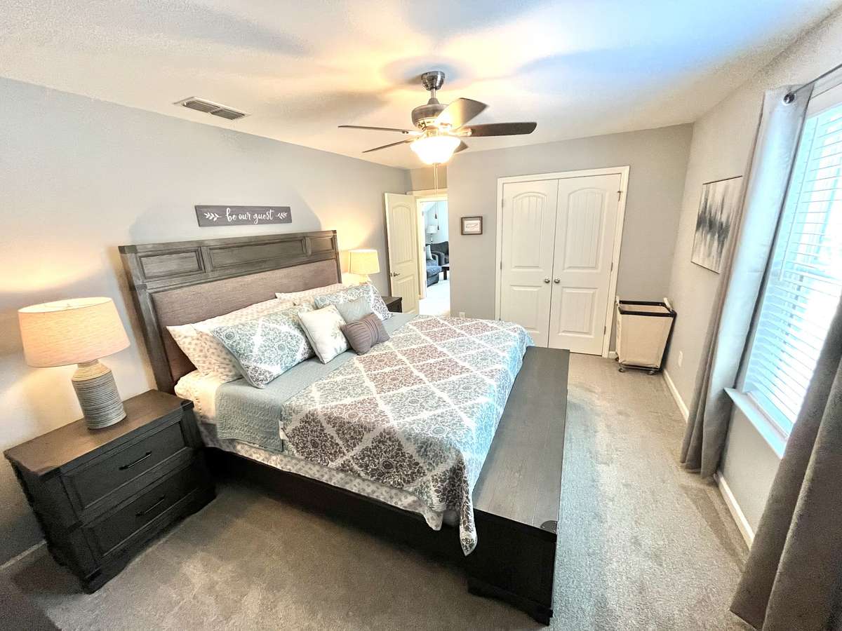 Upstairs bedroom showing double door closet