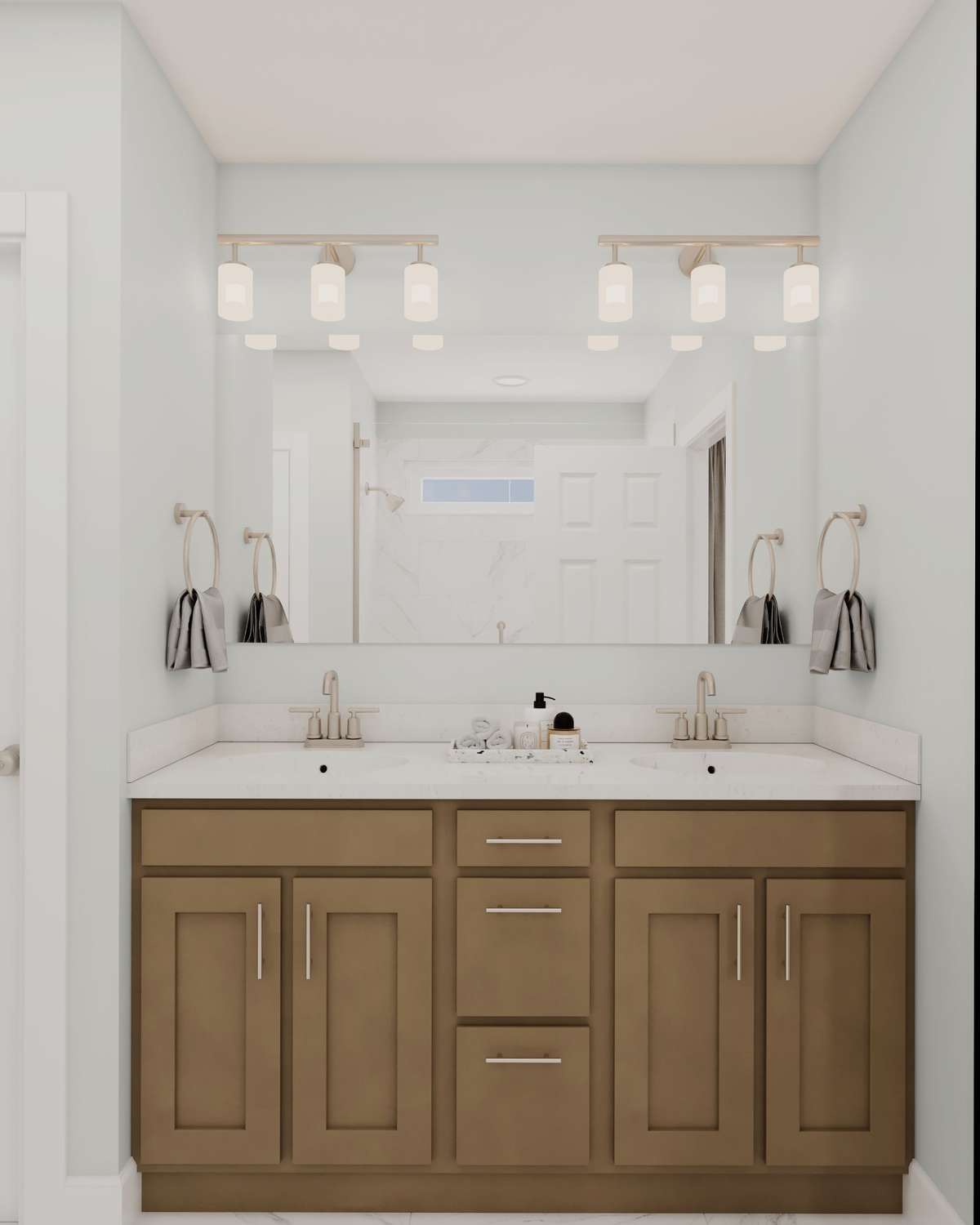 Primary suite features a private bathroom with tiled walk-in shower and double vanities!