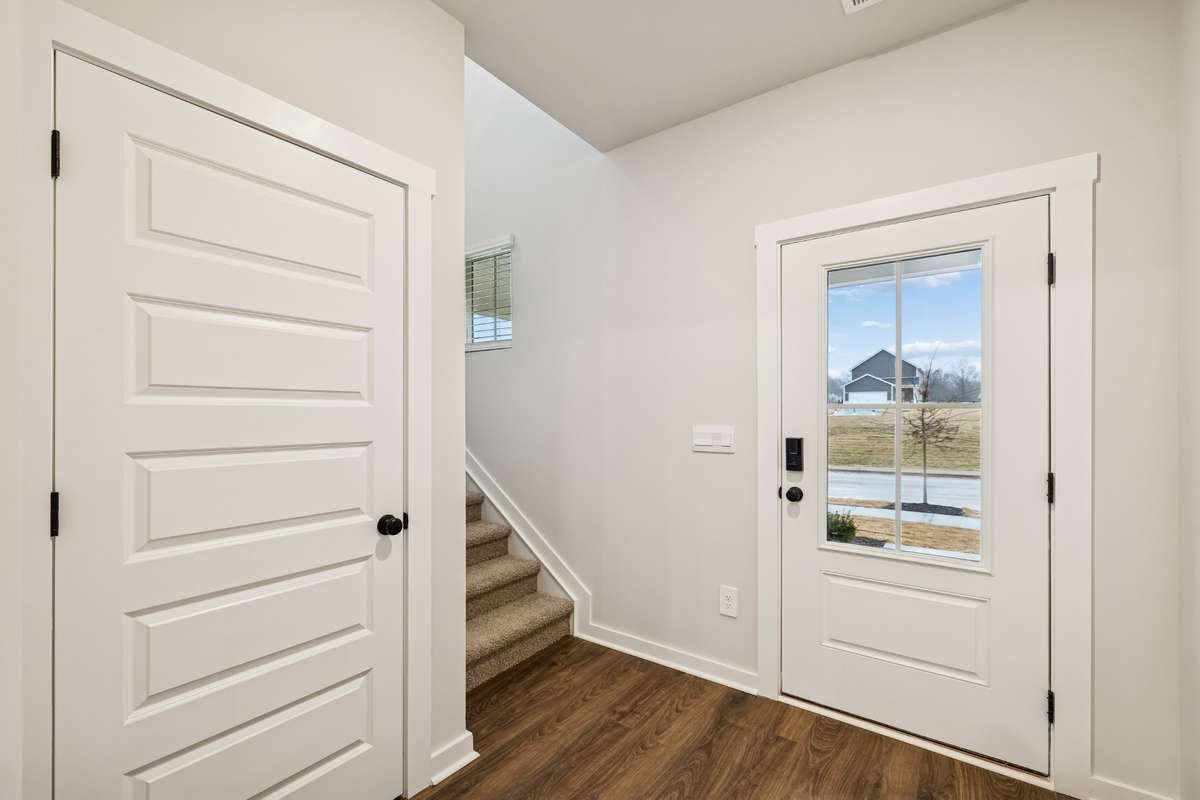 Pictures are of a previously built Belfort plan.  Color selections and options may be different in this one under construction