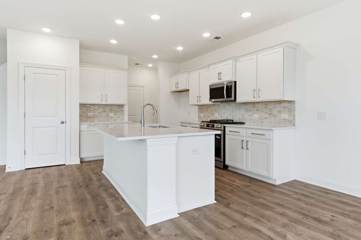 Photo of a previously built plan so finishes will vary. Visit the model for specifics.