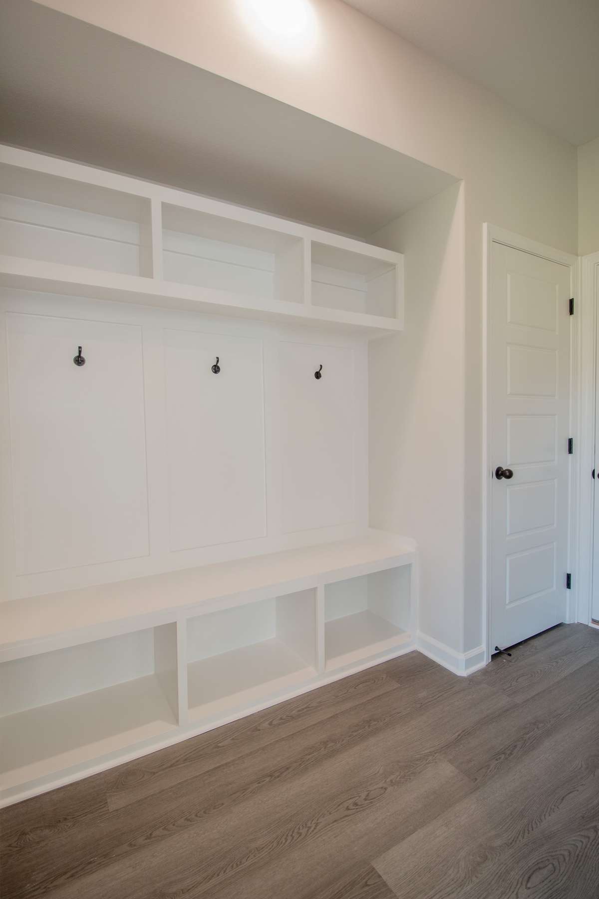 EXAMPLE>>> Mudroom off the Garage with a Built-in Hall Tree and a Closet!
