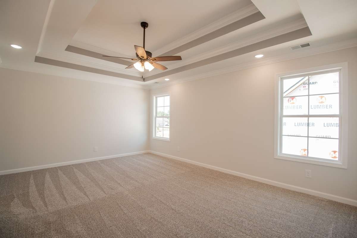 EXAMPLE>>> Primary Bedroom Features a Double Tray Ceiling, Crown Molding and Recessed Lighting!!