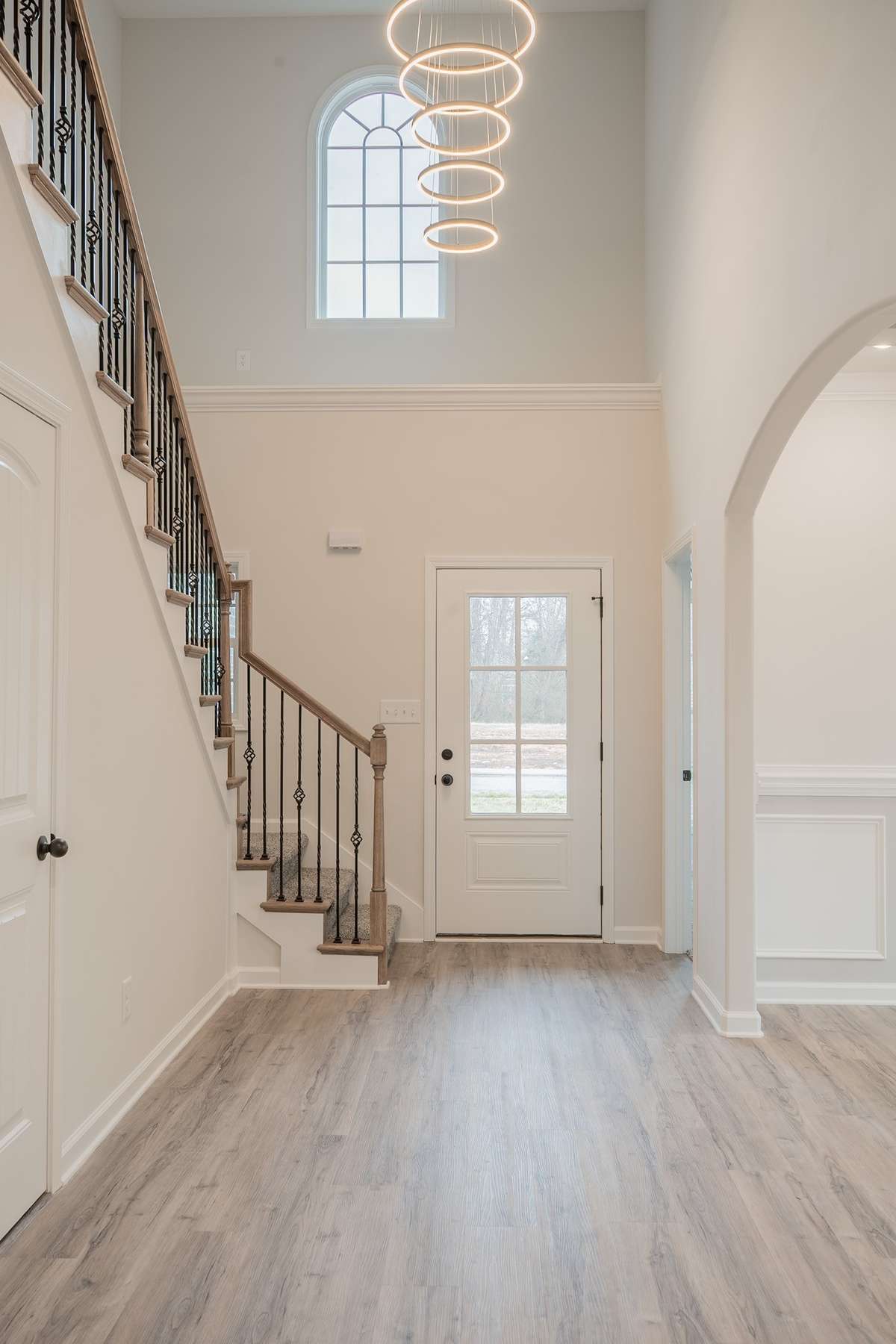 EXAMPLE>>> Spacious 2 Story Entry Foyer with Wood Flooring & an Elegant Chandelier Welcomes You In!