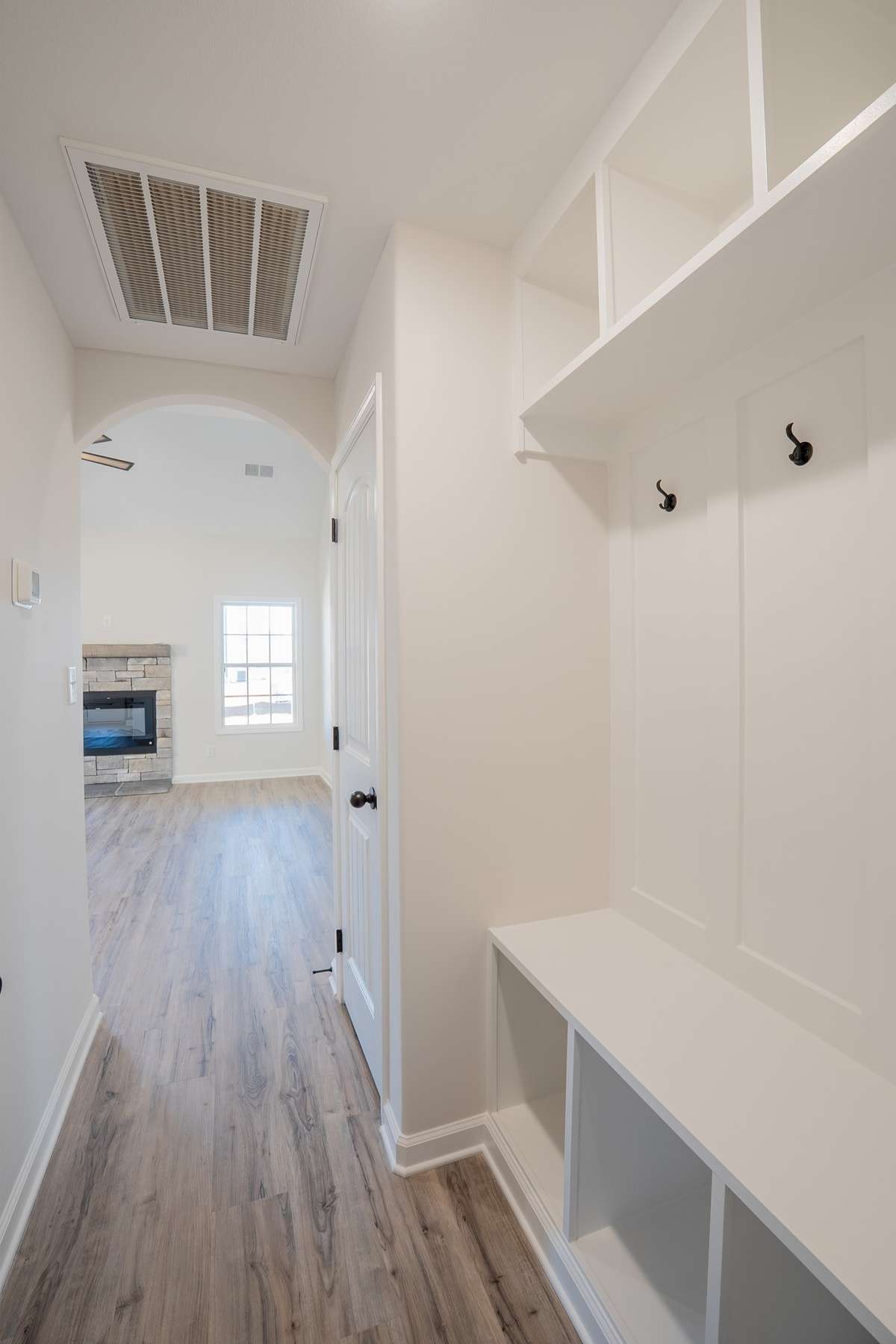 EXAMPLE>>> Off the Garage is a Mudroom w/ a Hall tree!
