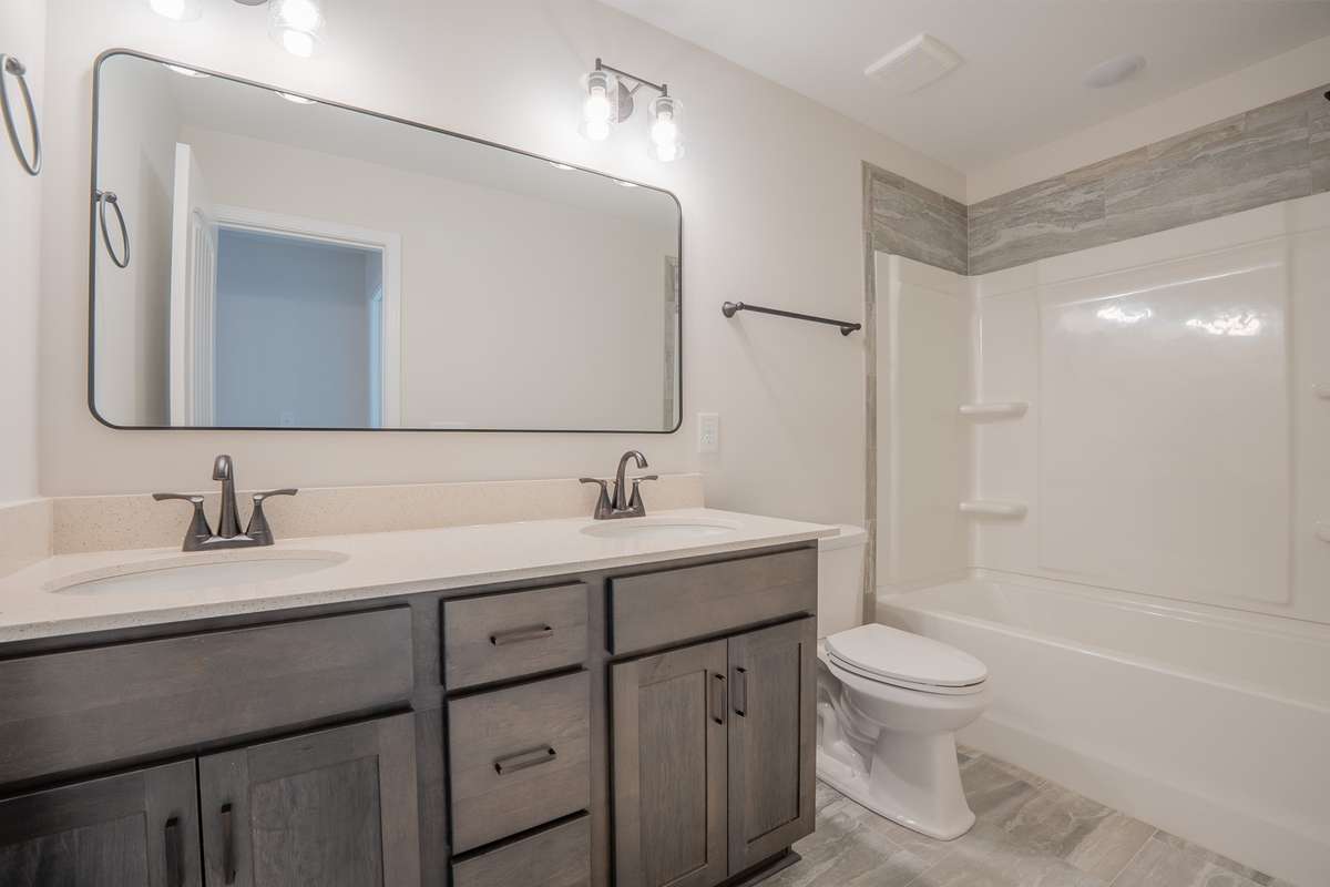 EXAMPLE>>> Guest Bathroom has a Large Double Vanity!