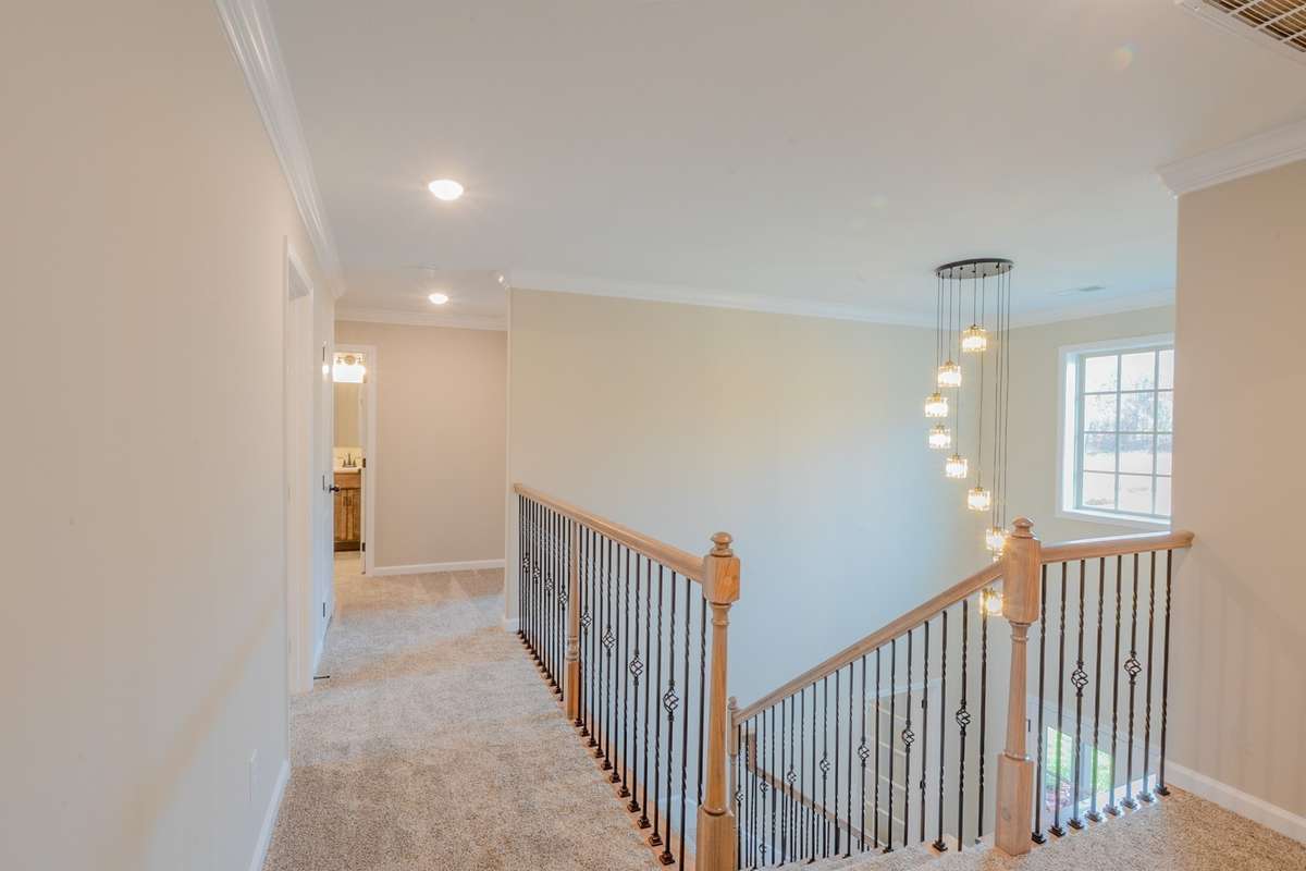 EXAMPLE>>>Large Open Upstairs Hallway with an Overlook to the Foyer!
