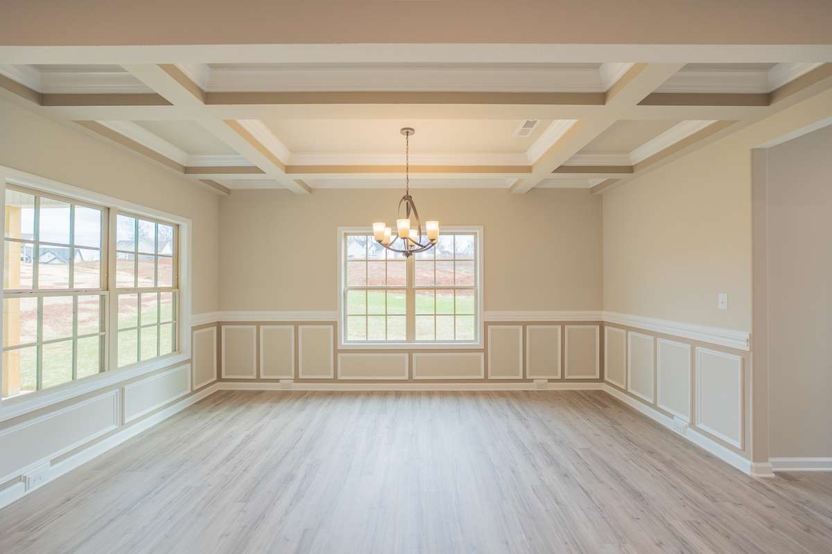 EXAMPLE>>>Large Formal Dining Room with Chair Railing, Wainscoting and Coffered Ceiling!