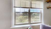 Great private view out the bonus room windows to the back of the home