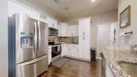Large kitchen with lots of cabinetry.... this is not your typical townhome.