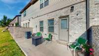 Large patio space... adding a covering would certainly enhance this area and add even more privacy.