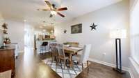 This space is versital, currently being used as a dining room but could also be a second living room space as well.