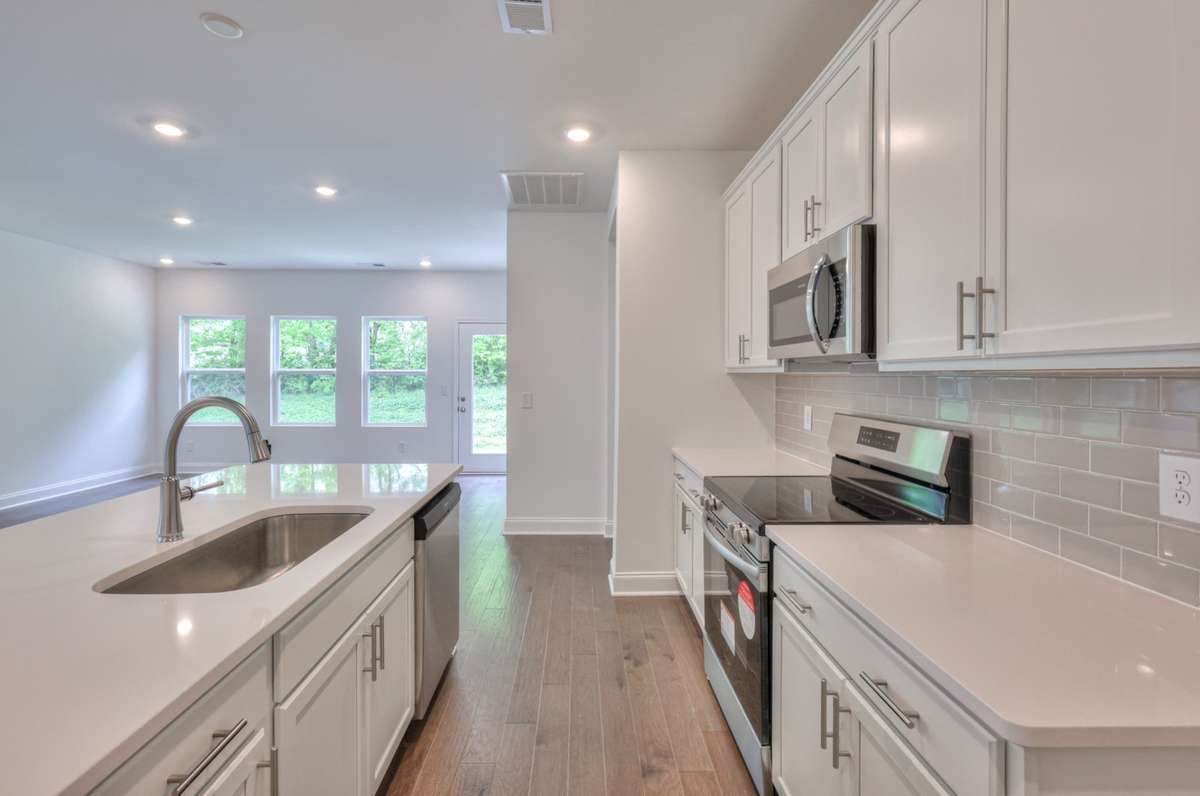 This photo is a sample of the Sutherland floorplan.  Options and exterior will vary depending on customer selections and preferences.