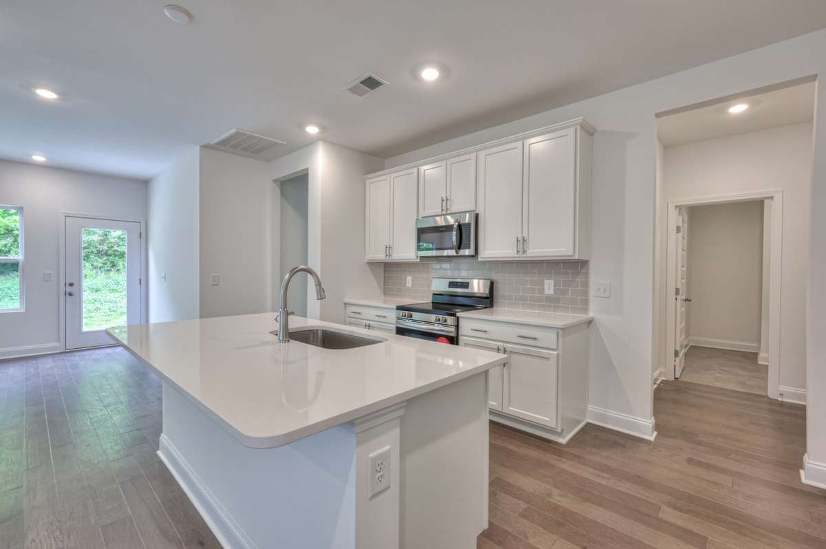 This photo is a sample of the Sutherland floorplan.  Options and exterior will vary depending on customer selections and preferences.