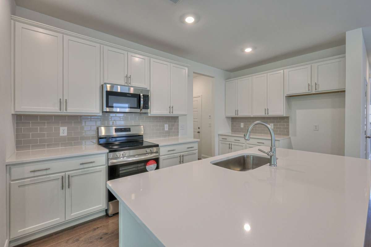 This photo is a sample of the Sutherland floorplan.  Options and exterior will vary depending on customer selections and preferences.