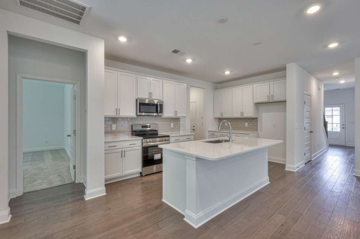 This photo is a sample of the Sutherland floorplan.  Options and exterior will vary depending on customer selections and preferences.