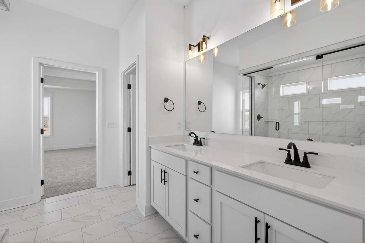 **Photos are of a model home and will not match all selections in subject property**